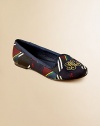 A stylish, comfortable flat is rendered in a colorful patchwork design and embellished with logo detail at the toe for a heritage look.Slip-onSynthetic patchwork upperLeather liningLeather soleImported