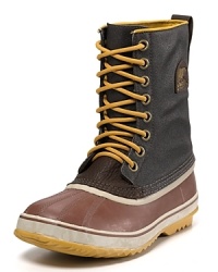 This rugged all-weather boot from Sorel keeps you warm and dry under any conditions, featuring a rubber shell toe and sides, waterproof leather and canvas upper and tough rubber sole.