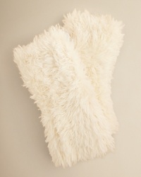 On a sled or little skis, your little snow bunny will float over the slopes in these soft, feathery fingerless gloves from Echo.