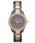 Surrounded by shimmering crystal accents, this elegant yet casual Stella watch from Fossil brings a wonderful change-of-pace to your daily look.