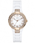 Rosy hues burst from a refined background on this shimmering timepiece from GUESS.