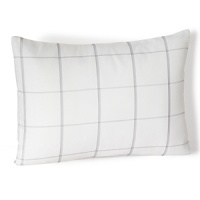 Classic style in a breezy open check, this Calvin Klein decorative pillow adds a clean, bright touch to both traditional and contemporary decor.