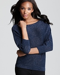 Bring sparkle to your daily looks with this Aqua sweater in a metallic knit.