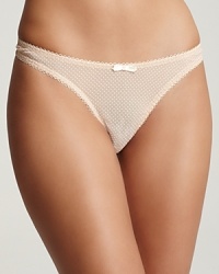 A mesh thong with scalloped edge trim in a raised dot print. Style #E16-314