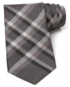 Burberry London preserves its heritage with a sophisticated signature check tie, crafted for a classic look that pairs well dressed up or down.