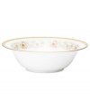 East meets West in the ornate Blooming Splendor vegetable bowl by Noritake. A Japanese-inspired pattern with raised dots encircles intricate florals rooted in white bone china.