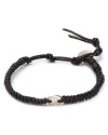 Rugged leather is offset by a flash of sterling silver for an ultra-cool bracelet that supports your masculine edge.