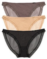 This stretchy bikini from Calvin Klein features a printed mesh front and scalloped lace trim. Style #D3453.