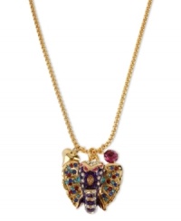 Pretty pachyderms. This Betsey Johnson pendant necklace showcases a colorful elephant with crystal accents, fuchsia crystal accents and a gold tone bubble heart. Crafted in antiqued gold tone mixed metal. Approximate length: 16 inches + 3-inch extender. Approximate drop: 1-1/4 inches.