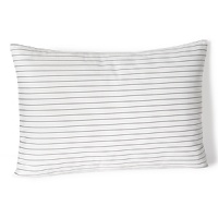 Classic style in clean seersucker stripes, this Calvin Klein decorative pillow adds a bright, playful touch to both traditional and contemporary decor.