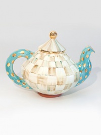 This unique serving piece, in hand-painted terra cotta with color-dragged checks and lustred gold accents, is a charmingly cheery addition to your tea party.Ceramic with golden lustre12 X 8.564 oz. capacityHand washMade in the USA