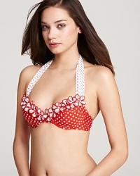 This retro polka dot bikini from Betsey Johnson was made with punky pin-ups in mind. Turn the boardwalk into a catwalk with a matching red lip and cat eye shades.