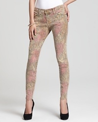 Update your fall denim wardrobe with python print Current/Elliott cropped skinny jeans.