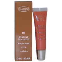 Instant Sun Light Lip Balm SPF 6 No 1 Sunset Bronze By Clarins for Women, 0.46 Ounce