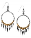 Points well taken. This pair of earrings from RACHEL Rachel Roy is crafted from gold-tone and silver-tone mixed metal with glass stones. Spikes place this pair on the cutting edge. Approximate drop: 2-3/4 inches. Approximate diameter: 1-1/2 inches.