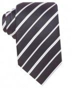 Timeless black and white stripes make this Geoffrey Been silk tie a versatile pick.