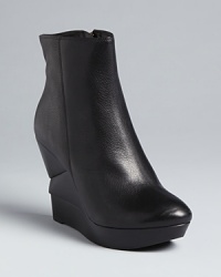 These sculptural DIANE von FURSTENBERG wedge booties lend architectural appeal to wear-daily booties.