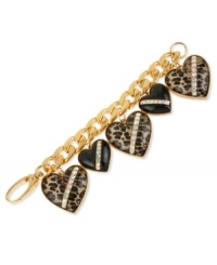 Wild at heart. This chain bracelet from Betsey Johnson is crafted from gold-tone mixed metal with black heart glass stones with crystal accents, some of which are styled with leopard print for a bit of animal attraction. Approximate length: 7-1/2 inches.