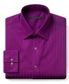 Subtle stripes and bold color keep this Sean John dress shirt in a league of its own.