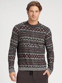 A slub-cotton style with an intriguing print and classic raglan sleeves.Pullover styleRaglan sleevesAbout 33 from shoulder to hem65% cotton/35% polyesterDry cleanImported