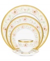 East meets West in the ornate Blooming Splendor place setting by Noritake. A Japanese-inspired pattern with raised dots encircles intricate florals rooted in white bone china.