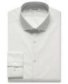 Stripes step up your style with this no-fuss no-iron slim-fit dress shirt from Calvin Klein.