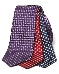 Brilliant toned silk tie covered in an eye-catching box pattern.