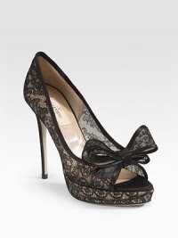 Utterly romantic in silk-trimmed lace with a beautiful big bow at the peep toe.Self-covered heel, 5 (125mm) Self-covered platform, 1¼ (30mm) Compares to a 3¾ heel (95mm) Peep toe Leather lining and sole Padded insole Made in ItalyOUR FIT MODEL RECOMMENDS ordering true size. 