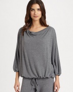 Flowy silhouette, impeccably constructed for a relaxed and comfortable fit. Draped boatneckThree-quarter length batwing sleeves with banded cuffsElastic waistPull-on style53% polyamide/47% woolMachine washImported