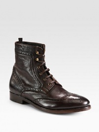 Traditional brogue detailing elevates the casual nature of this lace-up boot, crafted from rich Italian leather, with gold hardware and a sturdy leather sole for endless support.Leather upperLeather liningPadded insoleLeather soleMade in Italy