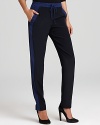 These Vince pants are right on track for trend-right style. Made of silk with color block tuxedo stripes, these comfy-luxe bottoms hit all the fashion high notes.