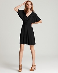 A relaxed silhouette and draped flutter sleeves up the style quotient of this Three Dots V neck dress.