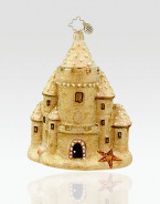 Add seaside charm to the tree with this goldtone sandcastle ornament in mouthblown glittered glass.Mouthblown, handpainted glass 5 high Made in Poland