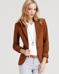 This versatile Theory jacket arrives in a warm autumnal hue, tailored in a classic two-button silhouette.