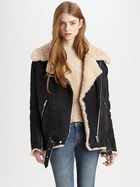 Concluded by a buckled hem and plethora of asymmetrical zippers, this leather topper has plush shearling trim and lining. Notched shearling collarAsymmetrical zipper and snap closuresLong sleeves with zippered cuffsZippered slash pocketsAdjustable buckle at hemAbout 31 from shoulder to hemLambskin leather with shearling trim and liningFur origin: UruguayDry clean with fur specialistImportedModel shown is 5'10 (177cm) wearing US size 4.