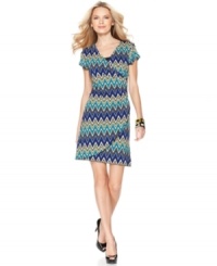 Wow them in this figure-flattering frock from Elementz. The abstract print enlivens the faux wrap silhouette.