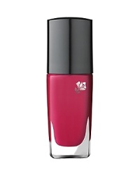 Inspired by the new trendy Rouge In Love lip collection, Vernis in Love is a high potency nail lacquer perfectly themed to complement every woman's mood and style. With ultimate brilliance, intense color and a mistake-free application, your nails will love the lasting shine and pop of color that stays put for days. Benefits:• Nails perfectly polished• High shine finish • Easy application Technology: • Multi-Polymers Complex provides a film that protects color and keeps nails perfectly polished• White Mica Lamellas reflect natural light for a high-shine finish• Grooved stem allows polish to flow directly to the center, while the elongated, round base distributes uniform color in a single stroke