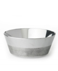 Redefining sophistication, Vera Wang marries modern geometry and classic elegance with this versatile bowl. Sharp lines and traditional ribbing detail combine for a unique, segmented pattern. (Clearance)