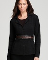 Whittle your waistline in a leather Eileen Fisher belt touting chic color blocking for a curve-contouring finish.