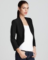 Collarless and cropped, this sleek Aqua blazer lends clean lines and modern style.