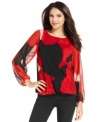 A stylish layering piece, this sheer petite top from Alfani adds a bold splash of color to your fall look!