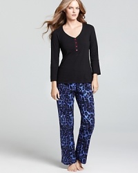 Flannel pajamas take a wild turn with this comfy, bed-ready set from Betsey Johnson.