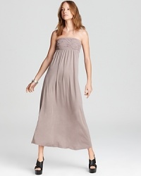 A strapless Design History maxi dress lends effortless chic to your day, then moves seamlessly into early evening. Embellished at the bust with pleated detail, the look epitomizes easy elegance.