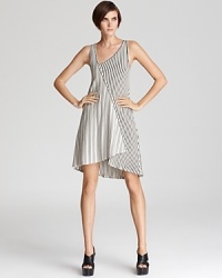 Cut a striking asymmetrical silhouette in this boldly striped Patterson J. Kincaid dress.