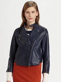 Modern approach to the classic biker jacket, this soft leather topper has asymmetrical zippers, oversized spread collar and an uneven hem. Snap closures at necklineSpread collar with snap closuresAsymmetrical zipperSingle front zipper pocketLong sleeves with zippered cuffsFully linedAbout 20 from shoulder to hemLeatherDry clean with leather specialistImportedModel shown is 5'10 (177cm) wearing US size 2.