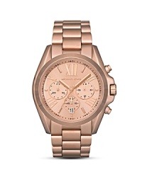 A classic timepiece in the season's most-wanted hue: rose gold. From Michael Kors.