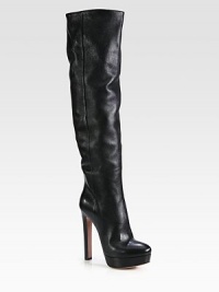 Tall leather silhouette with a side zip and high stacked heel. Stacked heel, 5½ (140mm)Covered platform, 1½ (40mm)Compares to a 4 heel, (100mm)Shaft, 20Leg circumference, 14Leather upperSide zipLeather liningLeather and rubber solePadded insoleMade in Italy