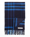 Burberry's oversized check adorns this luxe cashmere scarf.