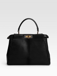 Sumptuous goatskin and calfskin with a structured silhouette, features signature Zucca logo lining.Top handle, 4½ drop Adjustable shoulder strap, 15-26 drop Turnlock closure Protective metal feet One inside zip pocket Fully lined 13W X 10H X 4D Made in Italy