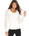 Adorned with cute studs, this cable-knit sweater from XOXO will keep you warm and fashion-forward at the same time!